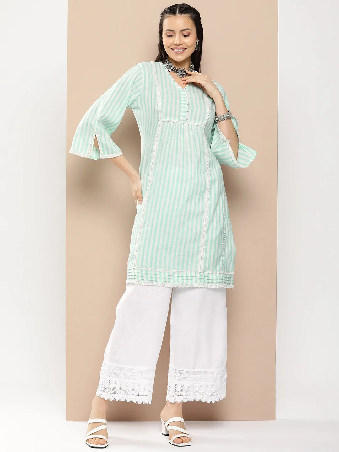 Sea Green And White Striped Kurta With Lace Detailing & Off White Palazzos.